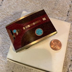 Metal belt buckle inlaid with wood and turquoise
